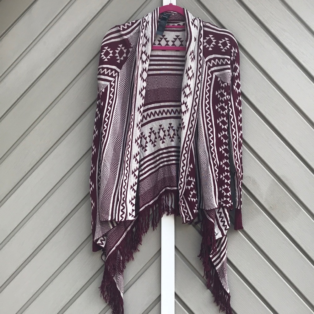 Open cardigan fringed bottom